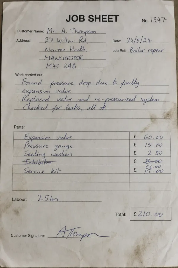 Handwritten field-service job sheet
